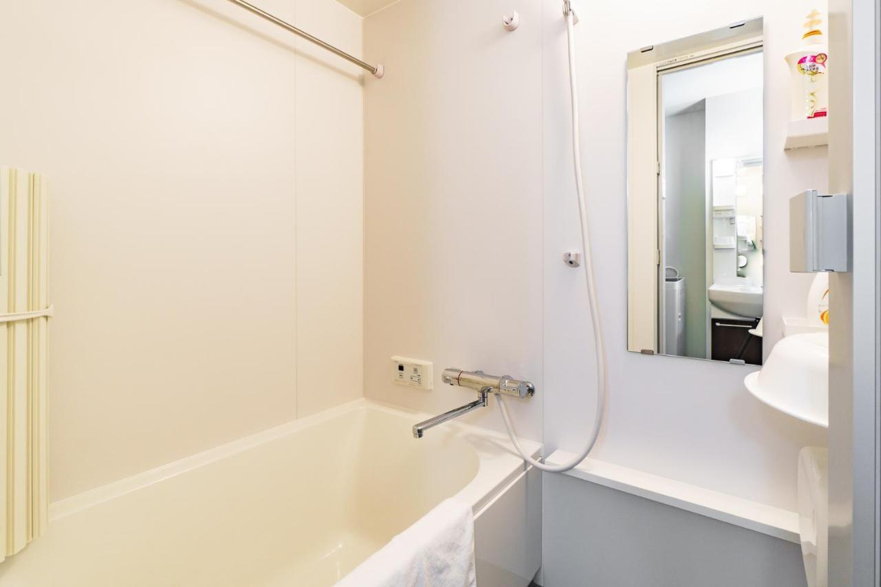 Ikidane Residential Hotel Shimanouchi Osaka Bagian luar foto